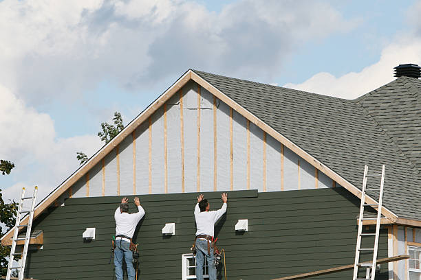 Professional Siding Replacement technician working in Arvada, CO